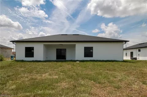 Exterior - 943 Commodore St, Lehigh Acres, FL 33974 photo 4 of 4