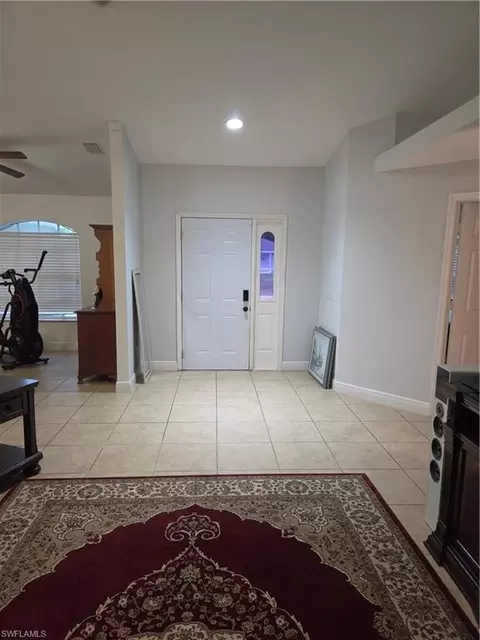 Entry Way - 1025 Iris St E, Lehigh Acres, FL 33974 photo 2 of 5