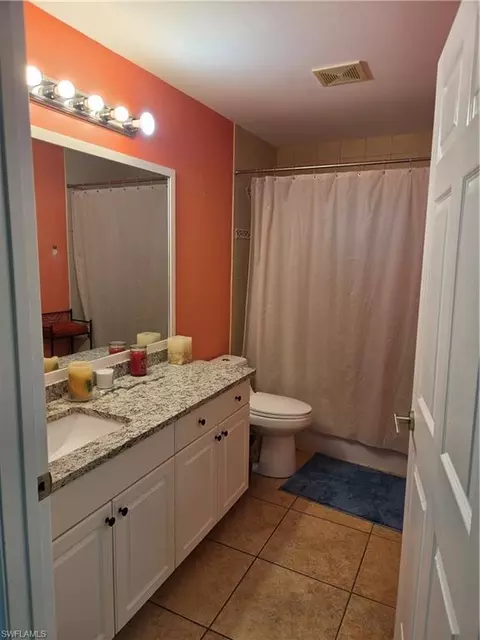 Bath - 1025 Iris St E, Lehigh Acres, FL 33974 photo 1 of 4