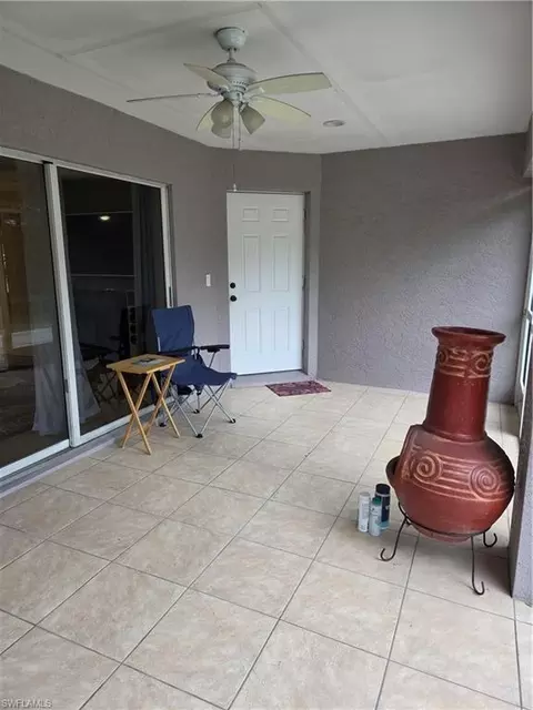 Exterior - 1025 Iris St E, Lehigh Acres, FL 33974 photo 11 of 13