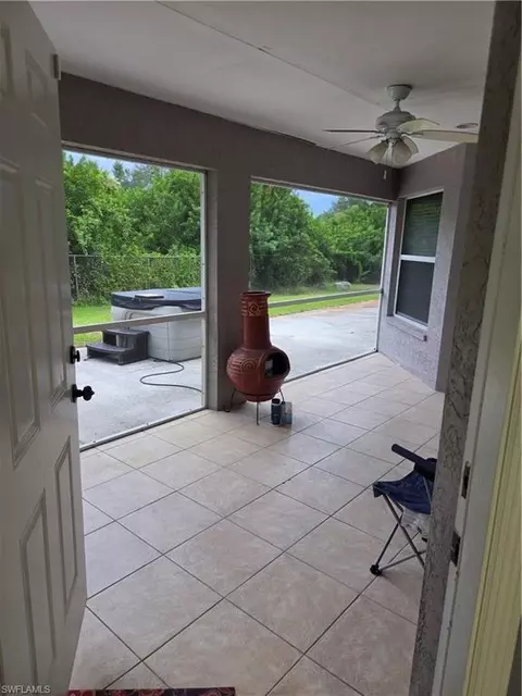 Exterior - 1025 Iris St E, Lehigh Acres, FL 33974 photo 13 of 13
