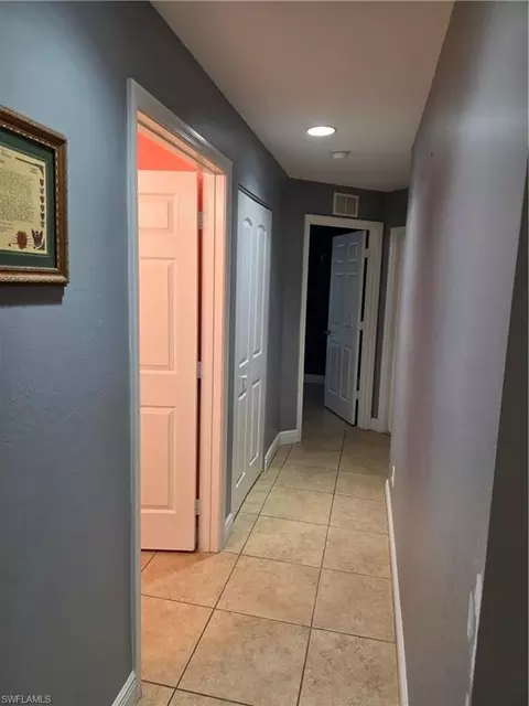 Entry Way - 1025 Iris St E, Lehigh Acres, FL 33974 photo 4 of 5