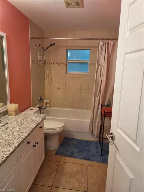 Bath - 1025 Iris St E, Lehigh Acres, FL 33974 photo 2 of 4