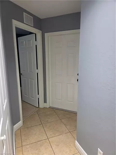 Entry Way - 1025 Iris St E, Lehigh Acres, FL 33974 photo 5 of 5