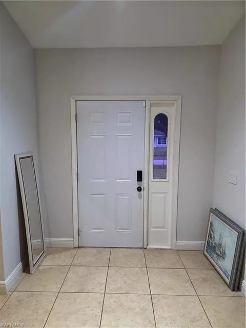 Entry Way - 1025 Iris St E, Lehigh Acres, FL 33974 photo 1 of 5