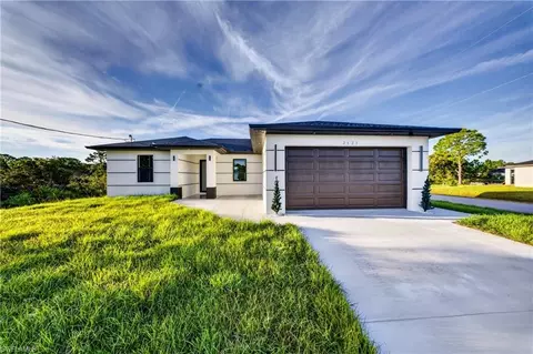 Exterior - 2621 40th St W, Lehigh Acres, FL 33971 photo 3 of 5