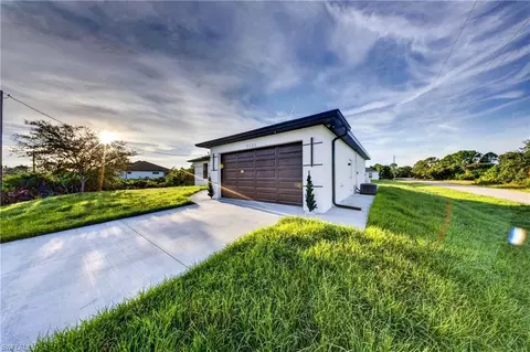 Exterior - 2621 40th St W, Lehigh Acres, FL 33971 photo 4 of 5