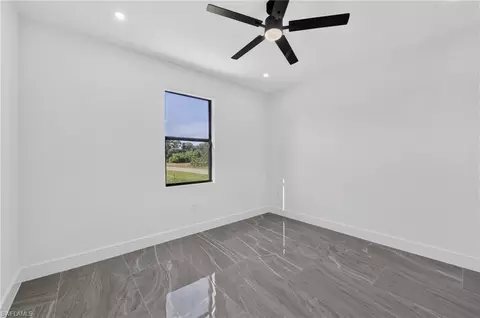 Bedroom - 2621 40th St W, Lehigh Acres, FL 33971 photo 2 of 6