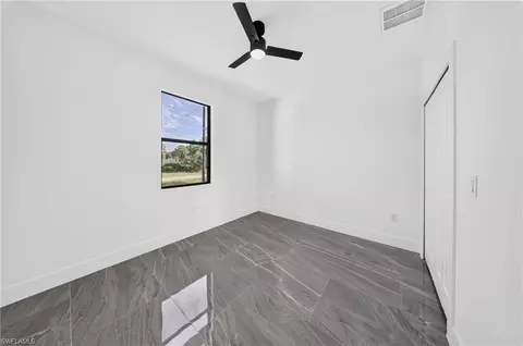 Bedroom - 2621 40th St W, Lehigh Acres, FL 33971 photo 6 of 6
