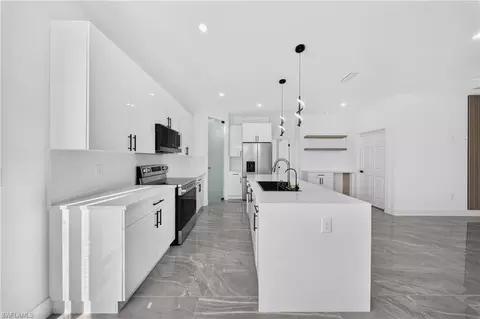 Kitchen - 2621 40th St W, Lehigh Acres, FL 33971 photo 1 of 6