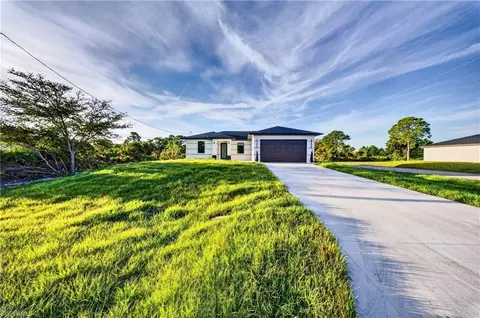 Exterior - 2621 40th St W, Lehigh Acres, FL 33971 photo 2 of 5