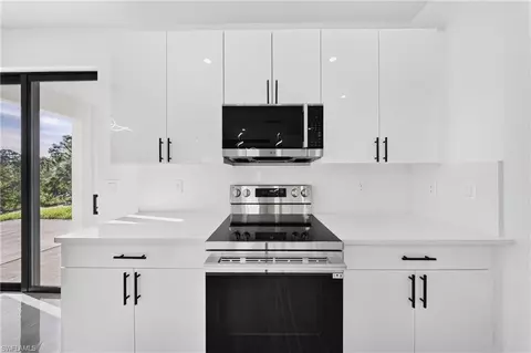Kitchen - 2621 40th St W, Lehigh Acres, FL 33971 photo 6 of 6