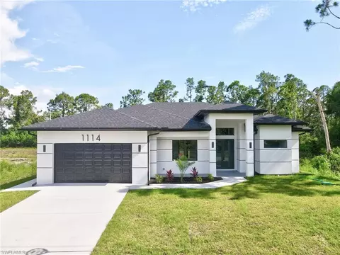 Exterior - 1114 Bari St E, Lehigh Acres, FL 33974 photo 2 of 13