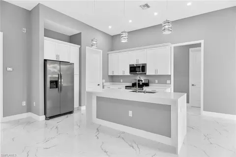 Kitchen - 1114 Bari St E, Lehigh Acres, FL 33974 photo 4 of 6