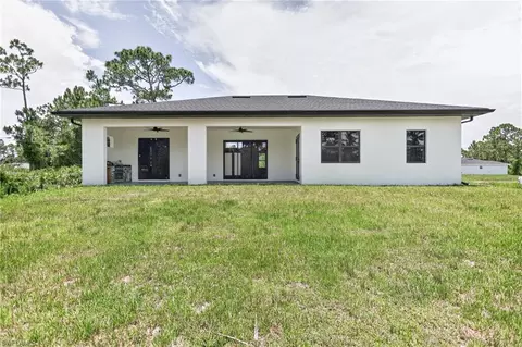 Exterior - 1114 Bari St E, Lehigh Acres, FL 33974 photo 9 of 13