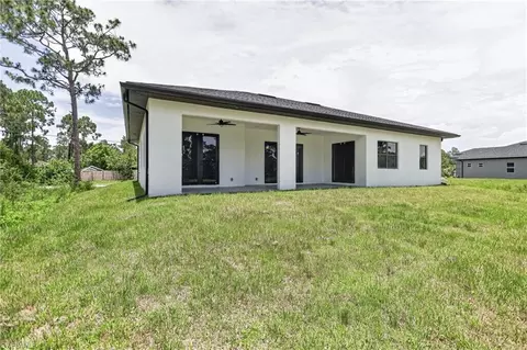 Exterior - 1114 Bari St E, Lehigh Acres, FL 33974 photo 10 of 13