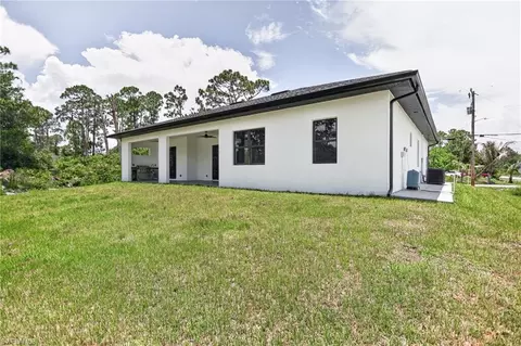 Exterior - 1114 Bari St E, Lehigh Acres, FL 33974 photo 11 of 13