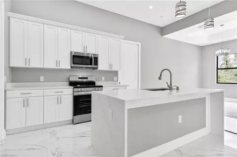 Kitchen - 1114 Bari St E, Lehigh Acres, FL 33974 photo 2 of 6