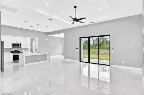 Living - 1114 Bari St E, Lehigh Acres, FL 33974 photo 4 of 5