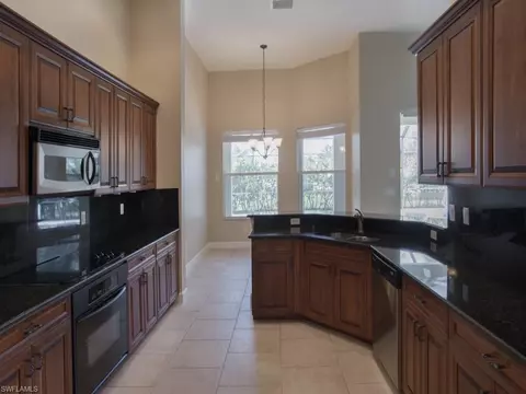 9041 Bronco Ct, Naples, FL 34113 photo 9