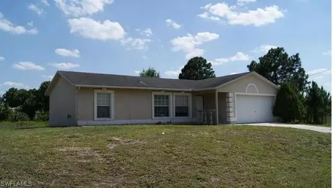 1154 Ebert St E, Lehigh Acres, FL 33974 photo 1