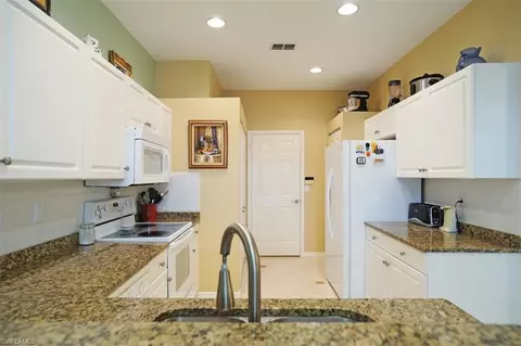 7452 Berkshire Pines Dr, Naples, FL 34104 photo 11
