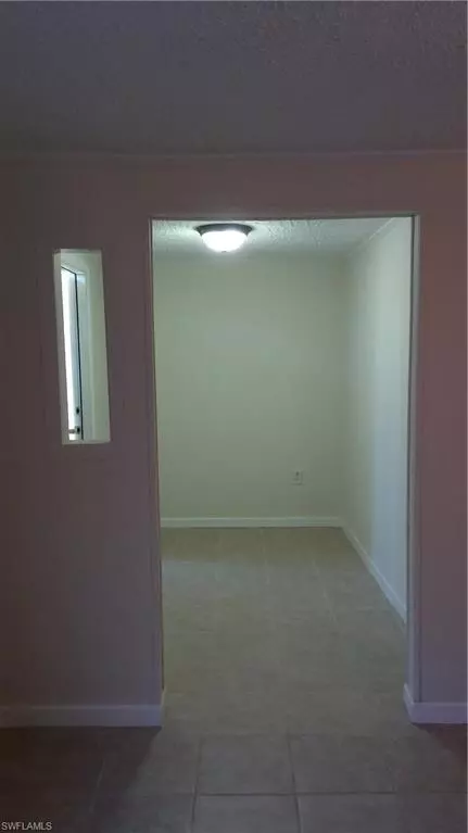 8650 Mockingbird Ln, Estero, FL 33928 photo 5