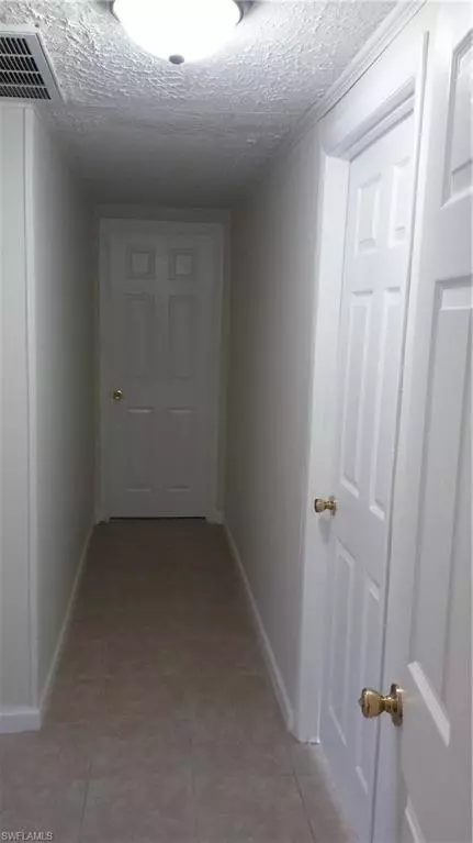 8650 Mockingbird Ln, Estero, FL 33928 photo 9