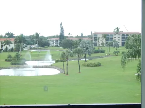 21 High Point Cir E #404, Naples, FL 34103 photo 1