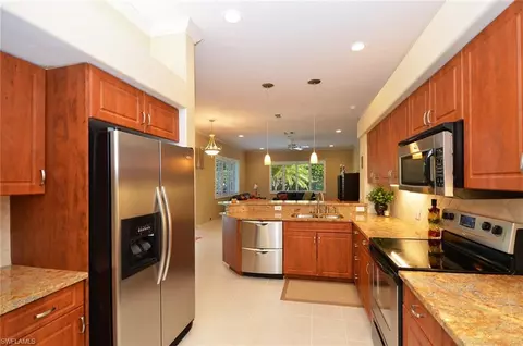 144 Spring Lake Cir, Naples, FL 34119 photo 1