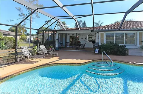 585 Whispering Pine Ln, Naples, FL 34103 photo 3