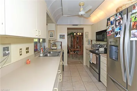 585 Whispering Pine Ln, Naples, FL 34103 photo 12