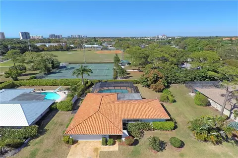 585 Whispering Pine Ln, Naples, FL 34103 photo 1