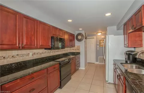 3048 Round Table Ln, Naples, FL 34112 photo 11
