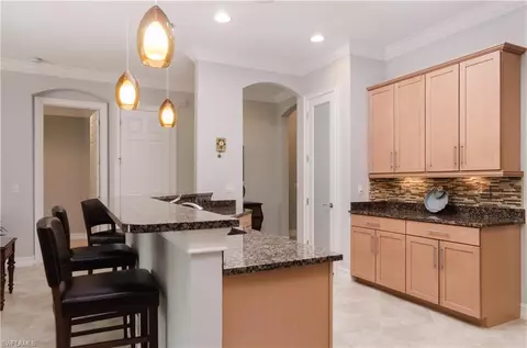 323 Saddlebrook Ln, Naples, FL 34110 photo 4