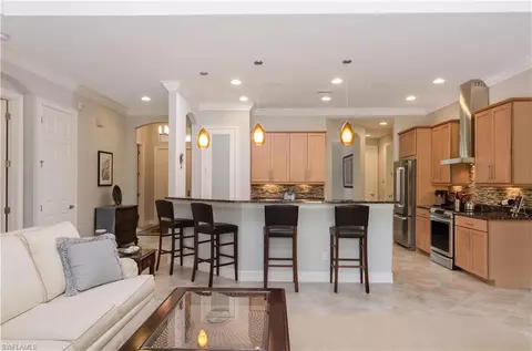 323 Saddlebrook Ln, Naples, FL 34110 photo 5