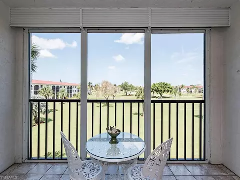 37 High Point Cir E #303, Naples, FL 34103 photo 1