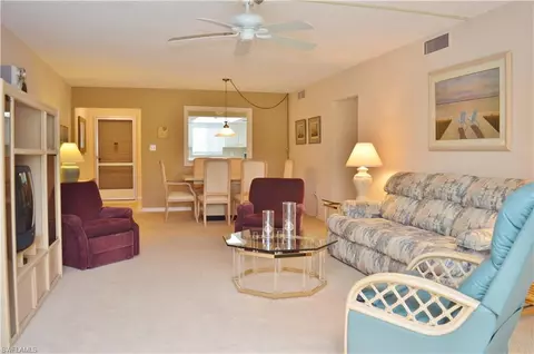 215 Cypress Way E #C8, Naples, FL 34110 photo 1