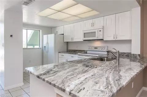 144 Cypress Way E #2, Naples, FL 34110 photo 1