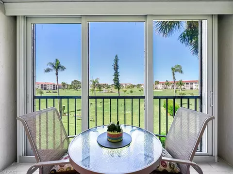 29 High Point Cir E #207, Naples, FL 34103 photo 1