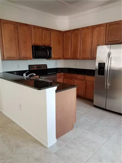 990 Peggy Cir #403, Naples, FL 34113 photo 1