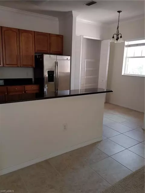 990 Peggy Cir #403, Naples, FL 34113 photo 2