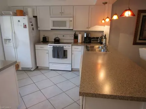 1051 Foxfire Ln #107, Naples, FL 34104 photo 6