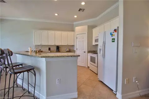 6802 Bent Grass Dr, Naples, FL 34113 photo 6