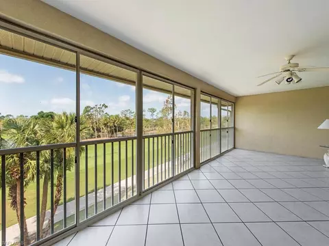 798 Eagle Creek Dr #303, Naples, FL 34113 photo 2