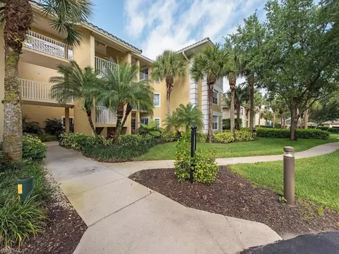 798 Eagle Creek Dr #303, Naples, FL 34113 photo 1