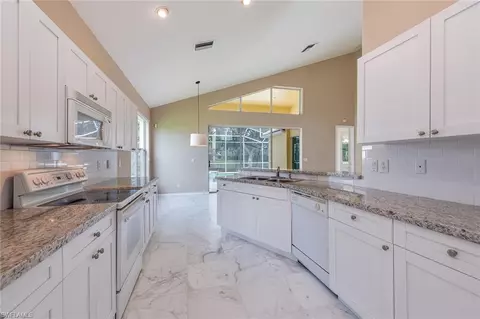 2011 Timarron Way, Naples, FL 34109 photo 8