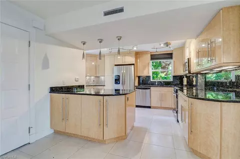 12945 Vanderbilt Dr #201, Naples, FL 34110 photo 1