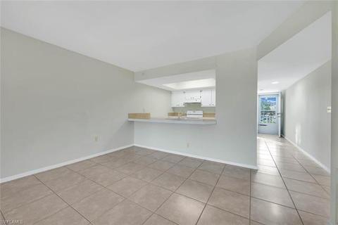 148 Cypress Way E #8, Naples, FL 34110 photo 1