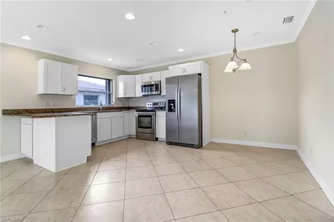 Kitchen - 605 97th Ave N, Naples, FL 34108 photo 1 of 4